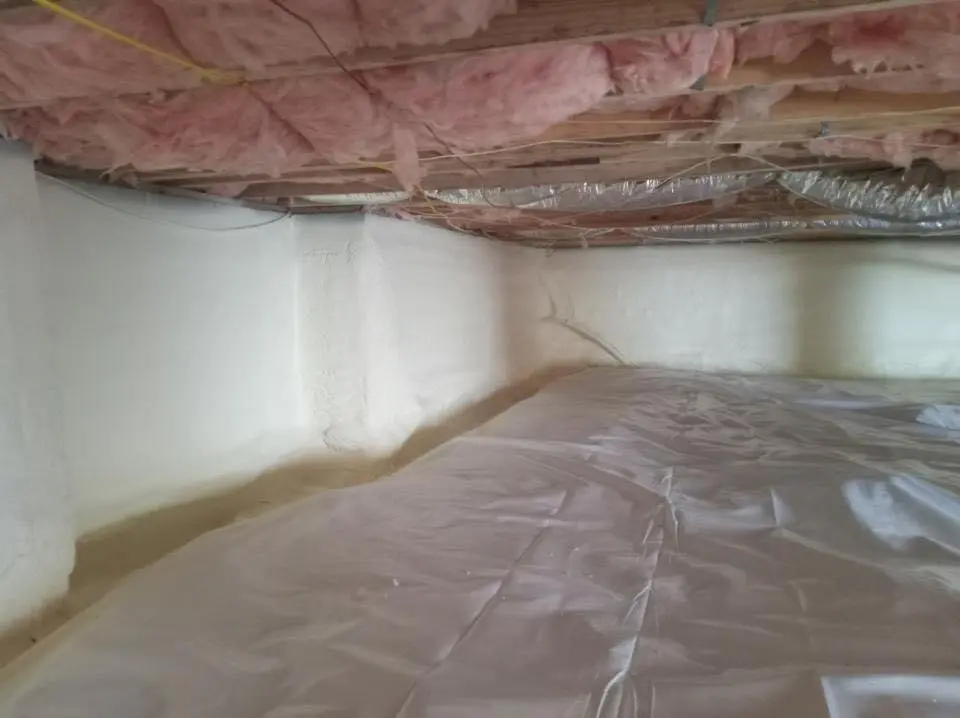 Crawl space encapsulation with closed-cell spray foam for Flat Roof Repair in Darien
